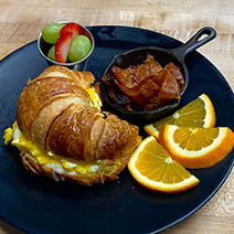 bacon egg and cheese on croissant